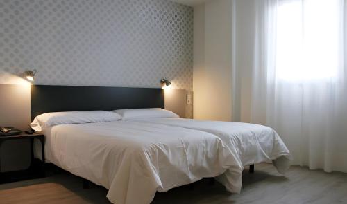 Habitación Doble Estándar - 1 o 2 camas del hotel Urban Dream Nevada. Foto 4