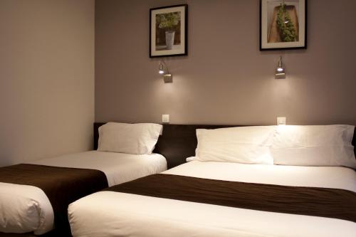 Habitación Triple Clásica del hotel Cosmos. Foto 1