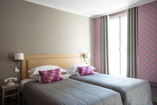 Habitación Doble - 2 camas del hotel Apollon Montparnasse. Foto 2