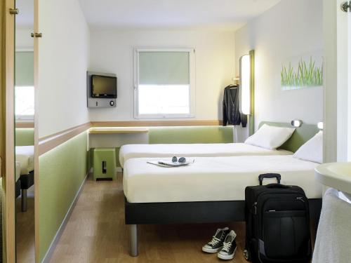 Habitación Doble Estándar - 2 camas del hotel Ibis Budget Lleida. Foto 2
