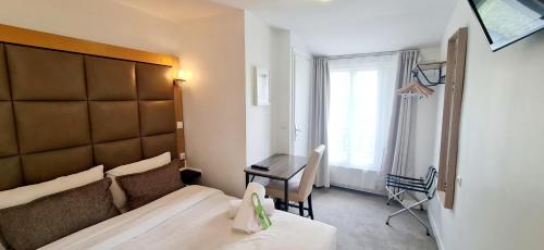 Habitación Doble Económica del hotel Hotel De France. Foto 5