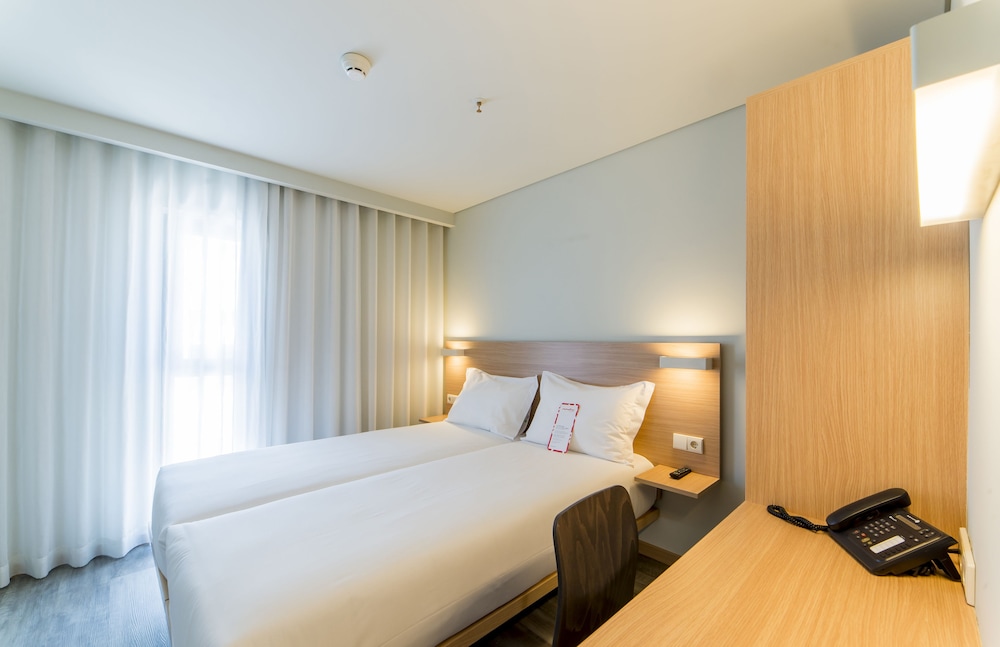 Habitación estándar con 2 camas individuales, 2 camas individuales del hotel Moov Porto Norte. Foto 1
