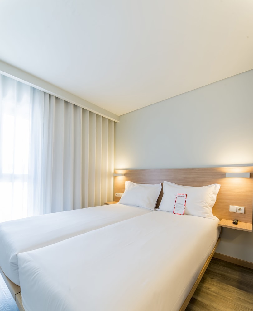 Habitación estándar con 2 camas individuales, 2 camas individuales del hotel Moov Porto Norte. Foto 3