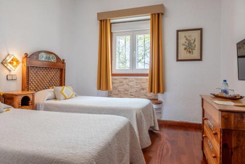 Habitación Doble - 2 camas del hotel El Refugio. Foto 4