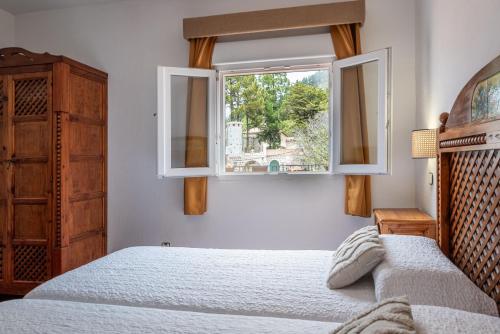 Habitación Doble - 2 camas del hotel El Refugio. Foto 10