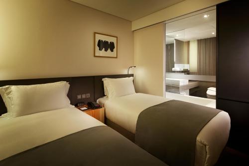 Habitación Doble Estándar - 2 camas del hotel Shilla Stay Gwanghwamun Myungdong. Foto 3