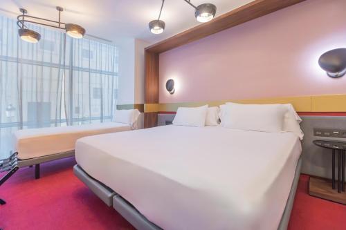 Habitación Triple del hotel Soho Boutique Granada. Foto 4