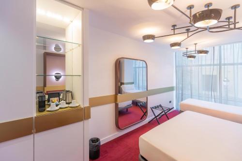 Habitación Triple del hotel Soho Boutique Granada. Foto 5