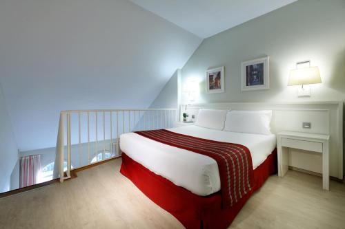 Habitación Familiar del hotel Exe Gran Solúcar. Foto 1