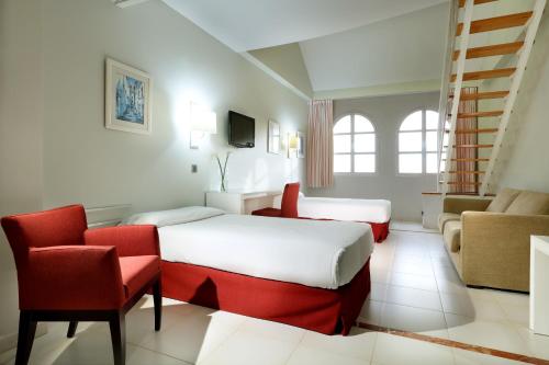 Habitación Familiar del hotel Exe Gran Solúcar. Foto 5