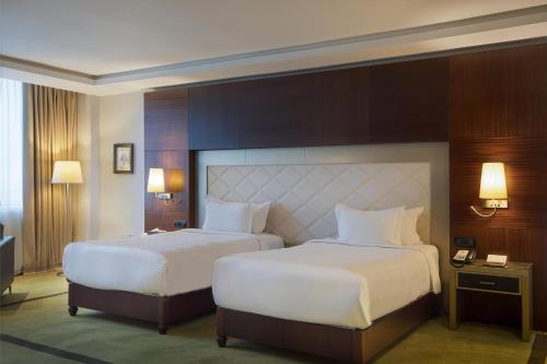 Habitación Doble Premium - 2 camas del hotel DoubleTree by Hilton Casablanca City Centre. Foto 1
