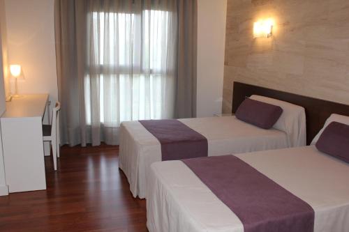 Habitación Doble - 1 o 2 camas del hotel Escuderos Hotel Cruz. Foto 4