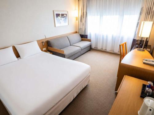 Habitación Clásica - 1 cama doble y 1 sofá - cama del hotel Novotel Nantes Centre Gare. Foto 5
