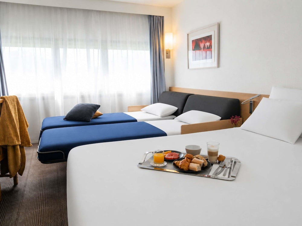 Habitación Clásica - 1 cama doble y 1 sofá - cama para 1 persona del hotel Novotel Nantes Centre Gare. Foto 7