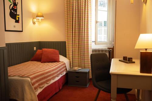 Habitación Individual Estándar del hotel Du Cygne Paris. Foto 2