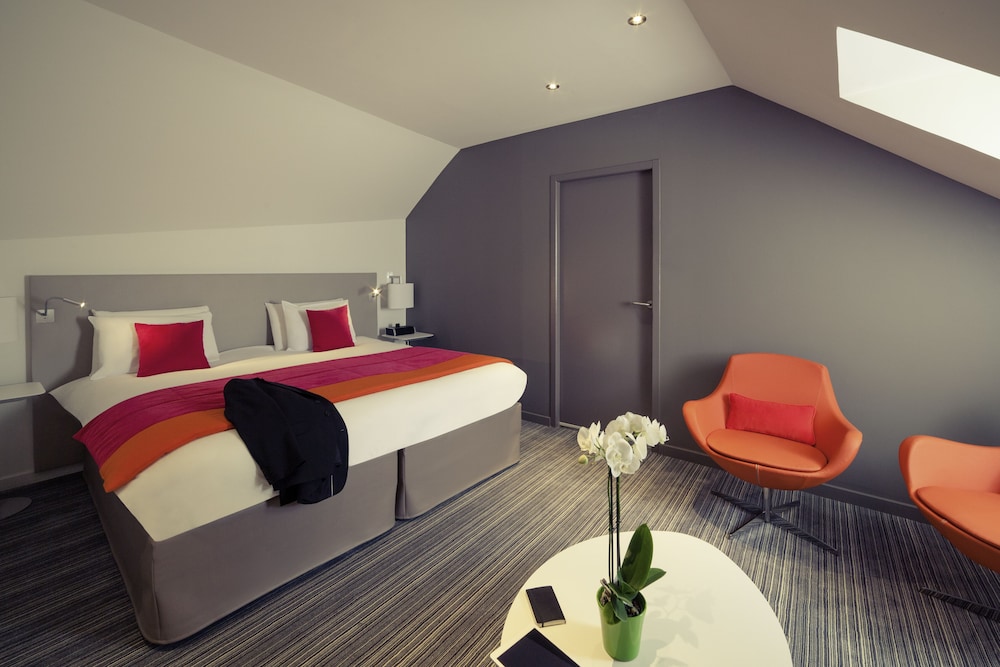 Suite ejecutiva, 1 cama de matrimonio grande con sofá cama del hotel Mercure Nantes Centre Grand. Foto 9