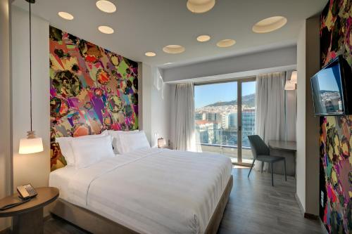 Habitación Supreme con vistas al monte Licabeto del hotel Athens Tiare By Mage Hotels