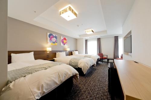 Habitación Triple Deluxe con cama supletoria del hotel Gran Ms Kyoto