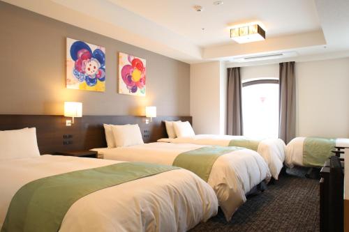 Habitación Triple Deluxe con cama supletoria del hotel Gran Ms Kyoto. Foto 1