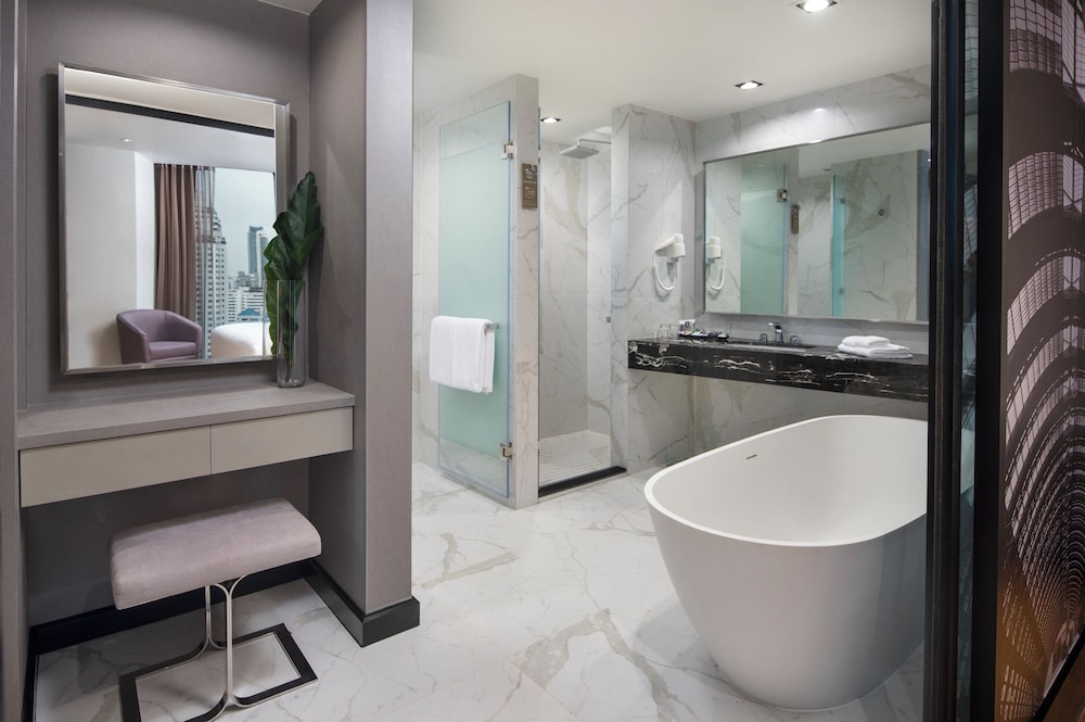 Suite, 1 cama de matrimonio grande del hotel Mercure Bangkok Makkasan. Foto 10