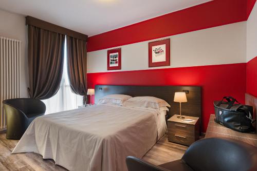 Habitación Triple del hotel Maranello Village. Foto 2