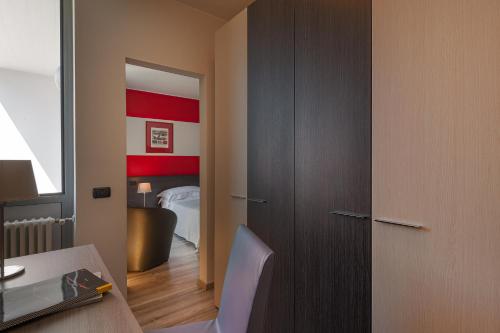 Habitación Cuádruple del hotel Maranello Village. Foto 1