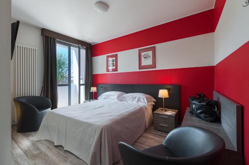Habitación Cuádruple del hotel Maranello Village. Foto 3