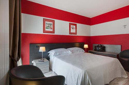 Habitación Cuádruple del hotel Maranello Village. Foto 6