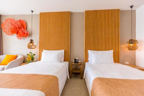 Habitación Doble Deluxe - 2 camas del hotel Wyndham Grand Phuket Kalim Bay. Foto 1