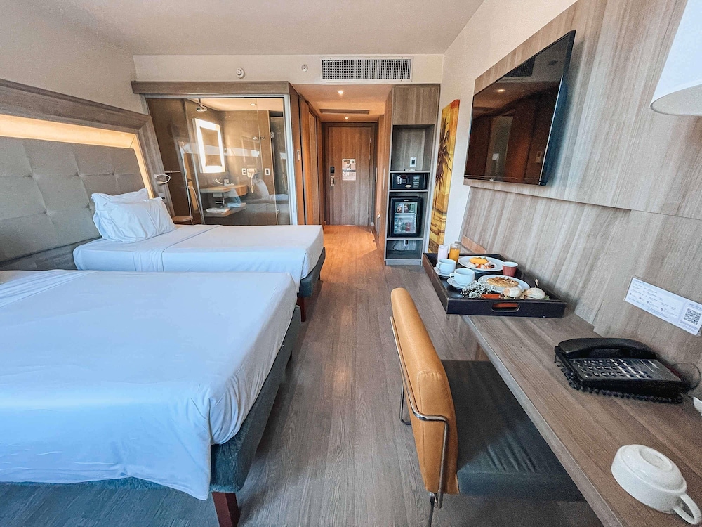 Apartamento de categoría superior con dos camas individuales del hotel Novotel Rj Praia De Botafogo. Foto 5