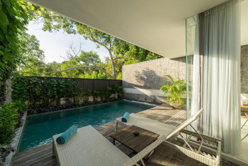 Villa Garden Pool de 1 dormitorio del hotel Hideaway Villas Bali Uluwatu By Kanaan Hospitality. Foto 1