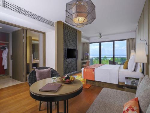 Suite Junior del hotel Movenpick Resort and Spa Jimbaran Bali - Chse Certified. Foto 2