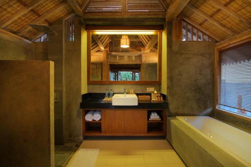 Habitación Deluxe del hotel Suarti Boutique Village. Foto 3