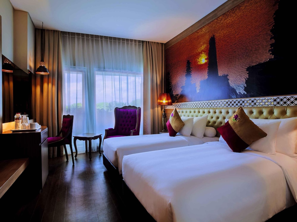 Habitación Premium Superior con 2 camas individuales del hotel Grand Mercure Yogyakarta Adi Sucipto