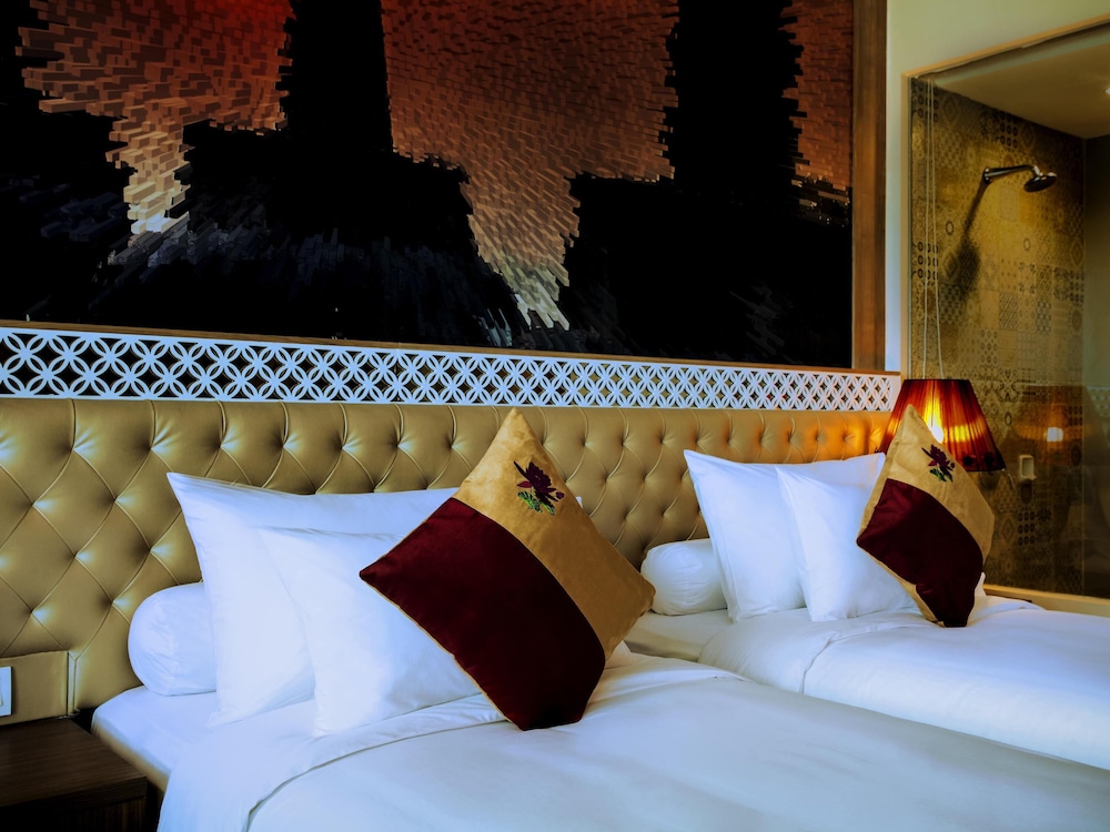 Habitación Premium Superior con 2 camas individuales del hotel Grand Mercure Yogyakarta Adi Sucipto. Foto 1