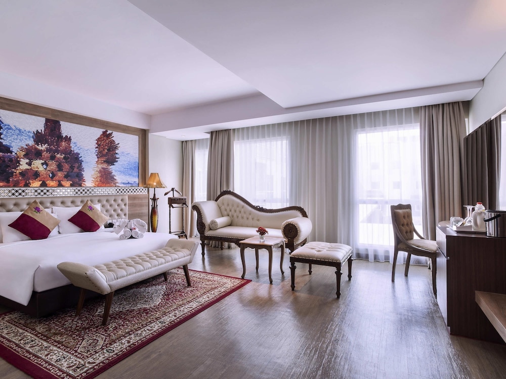 Habitación Executive con cama king size del hotel Grand Mercure Yogyakarta Adi Sucipto