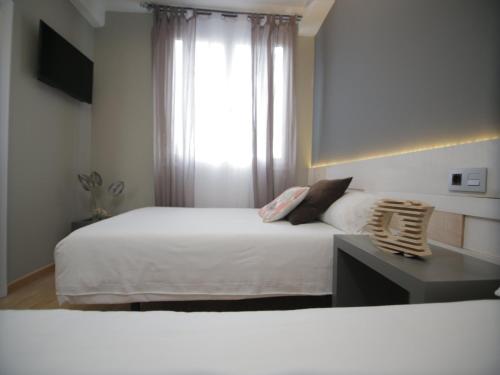 Habitación Doble con cama supletoria - 1 o 2 camas del hotel Alda Estación Vigo. Foto 1