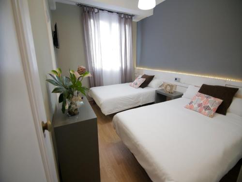 Habitación Doble con cama supletoria - 1 o 2 camas del hotel Alda Estación Vigo. Foto 3