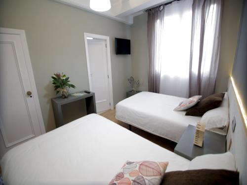 Habitación Doble con cama supletoria - 1 o 2 camas del hotel Alda Estación Vigo. Foto 4