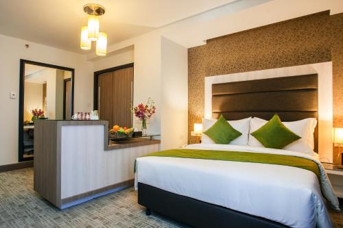 Habitación Deluxe - 1 cama grande del hotel Verdant Hill Kuala Lumpur. Foto 1