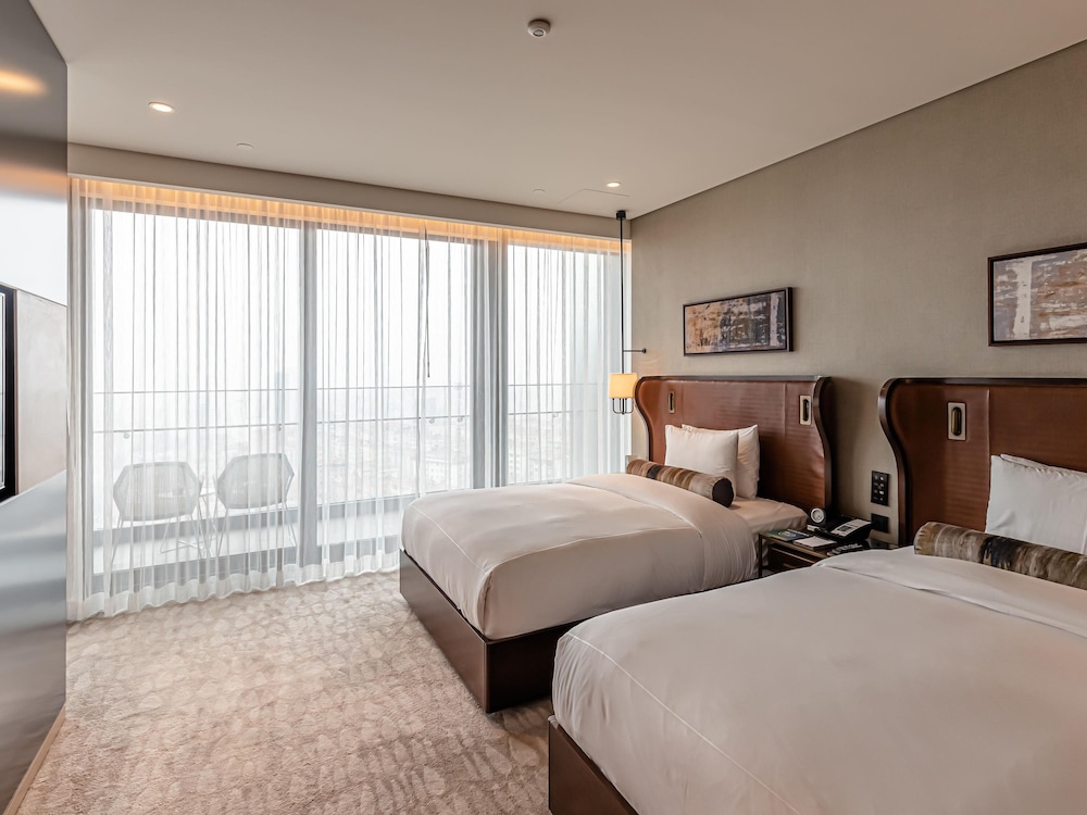 Habitación, 2 camas dobles, vistas a la ciudad del hotel Fairmont Quasar Istanbul. Foto 5