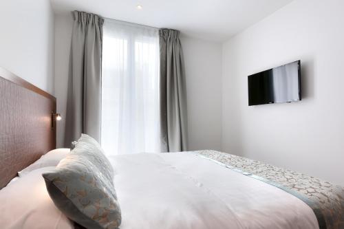 Habitación Triple del hotel LE TRENTE