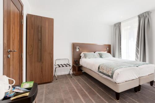 Habitación Triple del hotel LE TRENTE. Foto 1