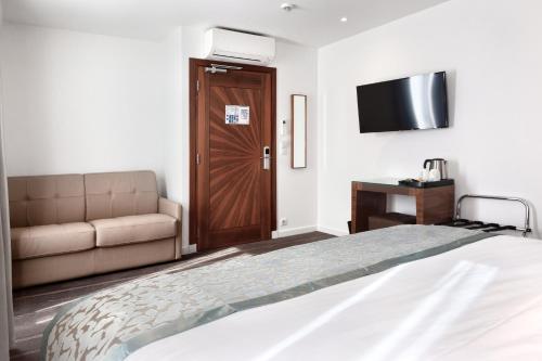 Habitación Triple del hotel LE TRENTE. Foto 3