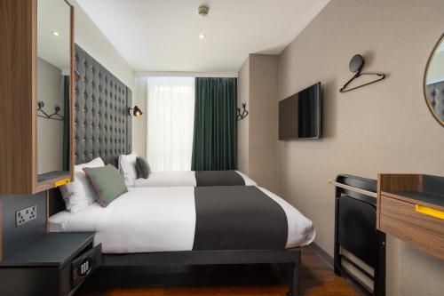 Habitación Doble con 2 camas, acogedora y con vistas del hotel Point A London Shoreditch. Foto 2