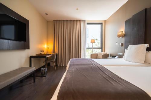 Habitación Doble Deluxe del hotel La Laguna Gran Hotel. Foto 5