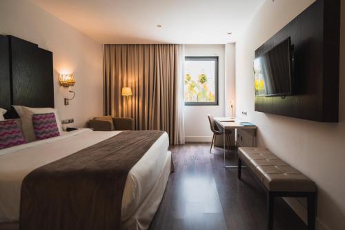 Habitación Doble Deluxe del hotel La Laguna Gran Hotel. Foto 12