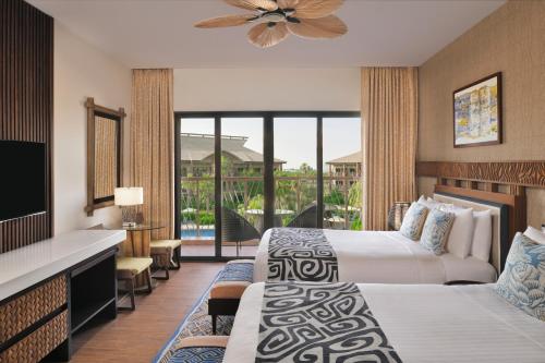 Deluxe Room, 2 Double Bed, Pool View, Balcony del hotel Lapita, Dubai Parks and Resorts, Autograph Collection. Foto 3