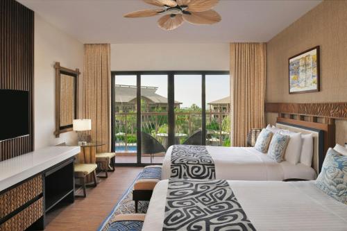 Deluxe Room, 2 Double Bed, Balcony del hotel Lapita, Dubai Parks and Resorts, Autograph Collection. Foto 5