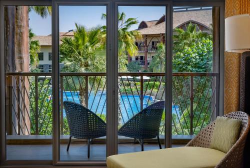 Suite, 1 bedroom Suite, 1 King, Resort view, Balcony del hotel Lapita, Dubai Parks and Resorts, Autograph Collection. Foto 1